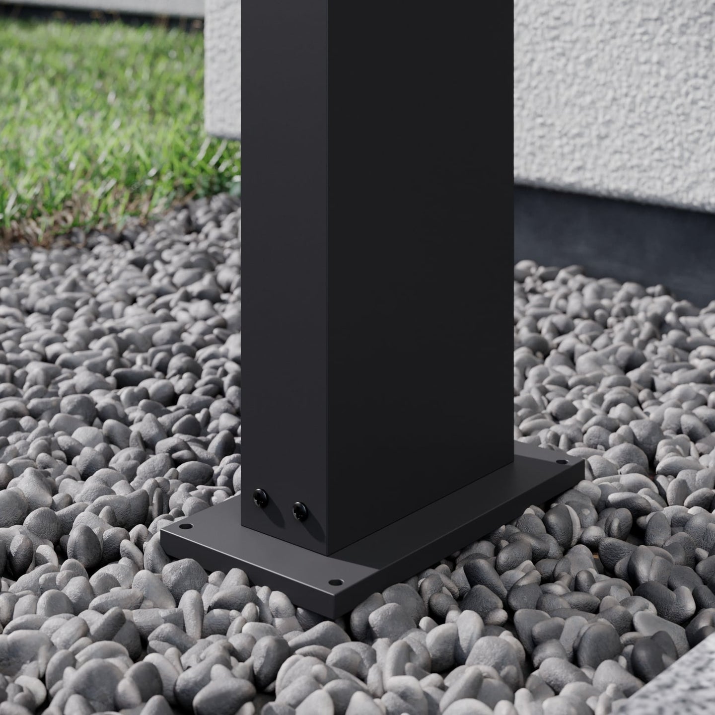 Close view of the bolt-down base plate of the Yola Path Post Light on gravel