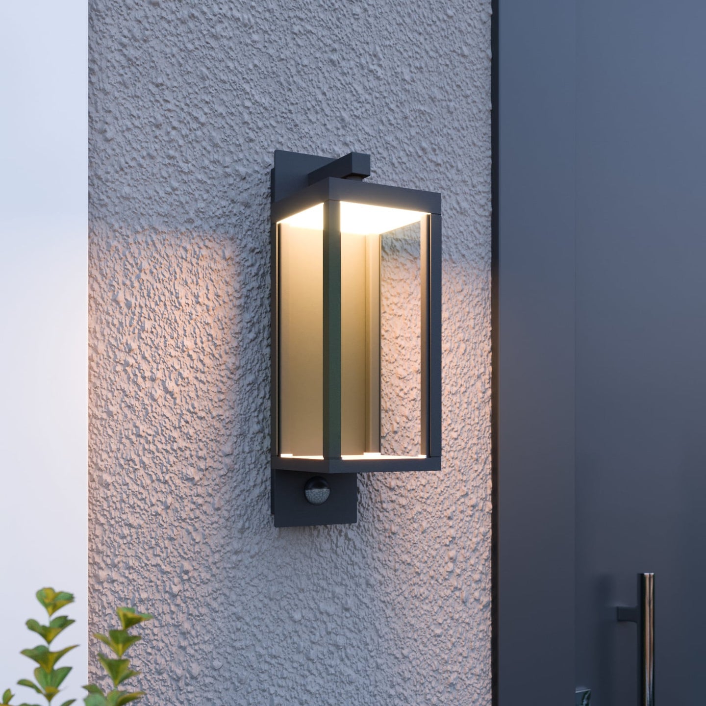 Denro sensor wall light lit at dusk on a textured render wall beside a dark front door
