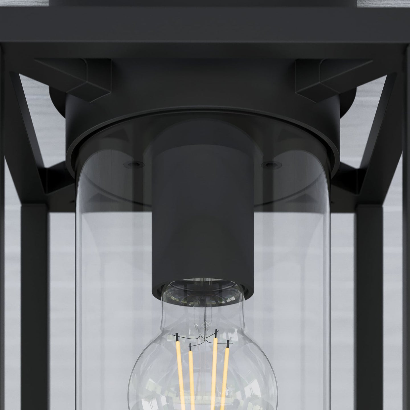 Detail of the Vesa E27 lamp holder inside the clear glass cylinder diffuser