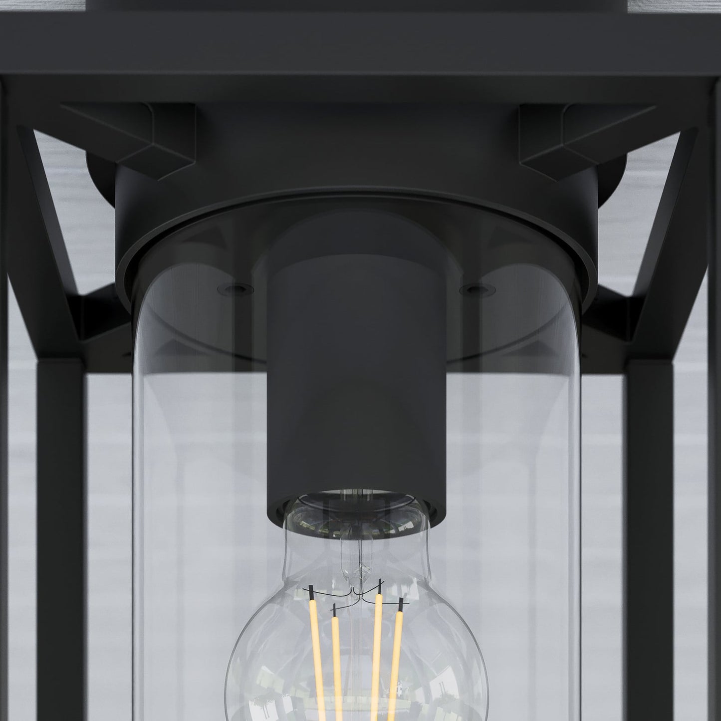 Detail of the Vesa E27 lamp holder inside the clear glass cylinder diffuser