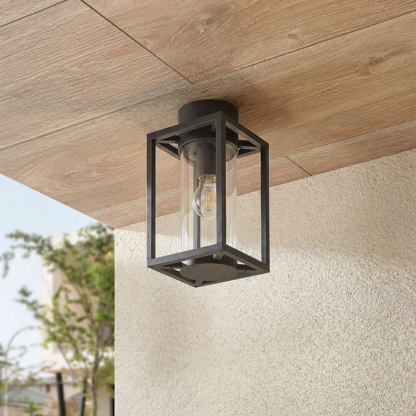 Vesa ceiling light seen from below on a covered outdoor terrace