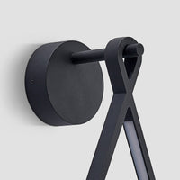 Detail of the Norva Stone Planter Outdoor Wall Light wall plate and bracket in black aluminium