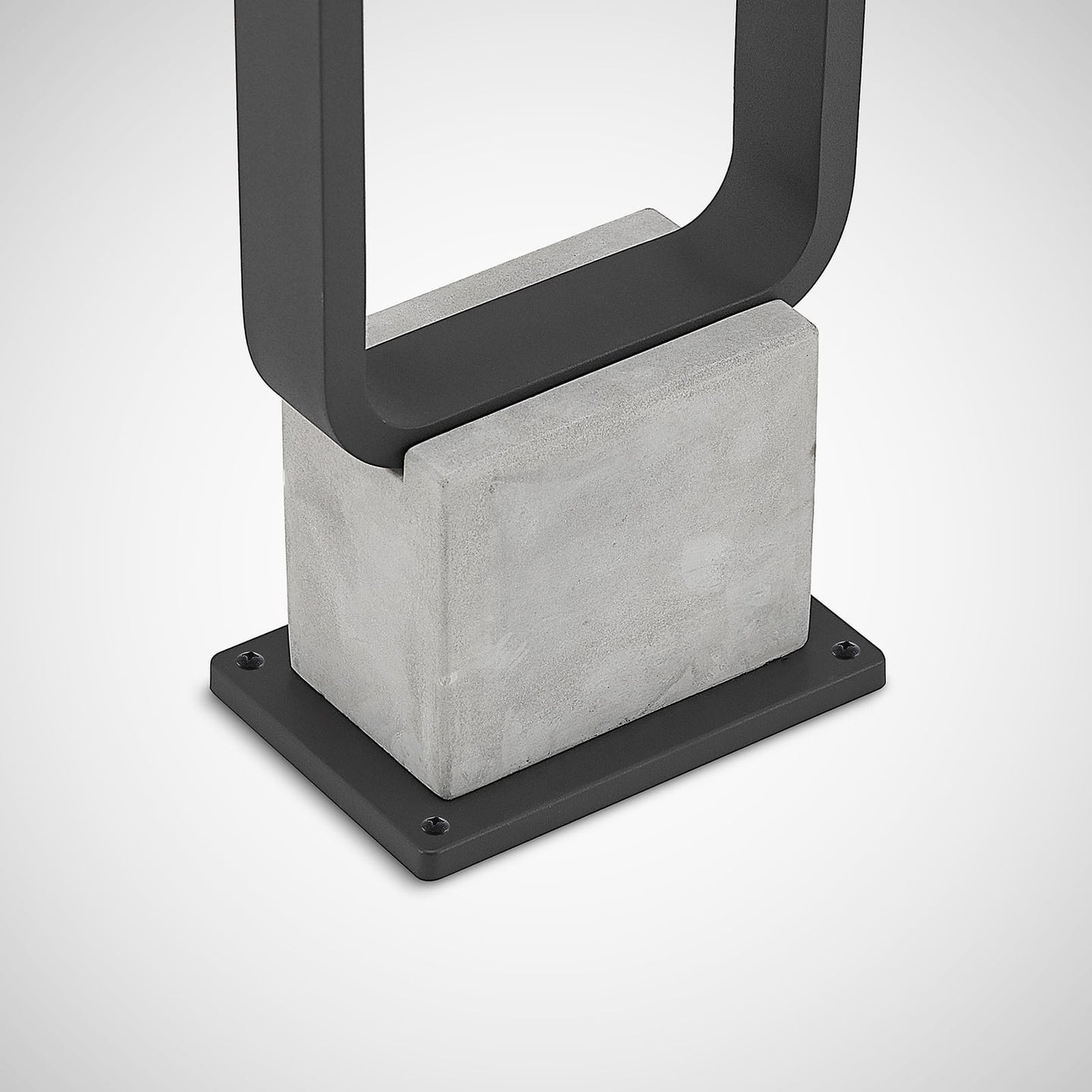 Close detail of the Talo cast concrete base block and flat steel mounting plate