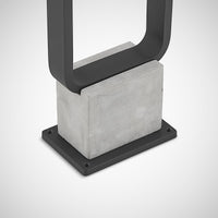Close detail of the Talo cast concrete base block and flat steel mounting plate