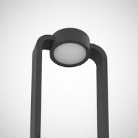 Close detail of the Talo circular LED head at the top of the anthracite frame
