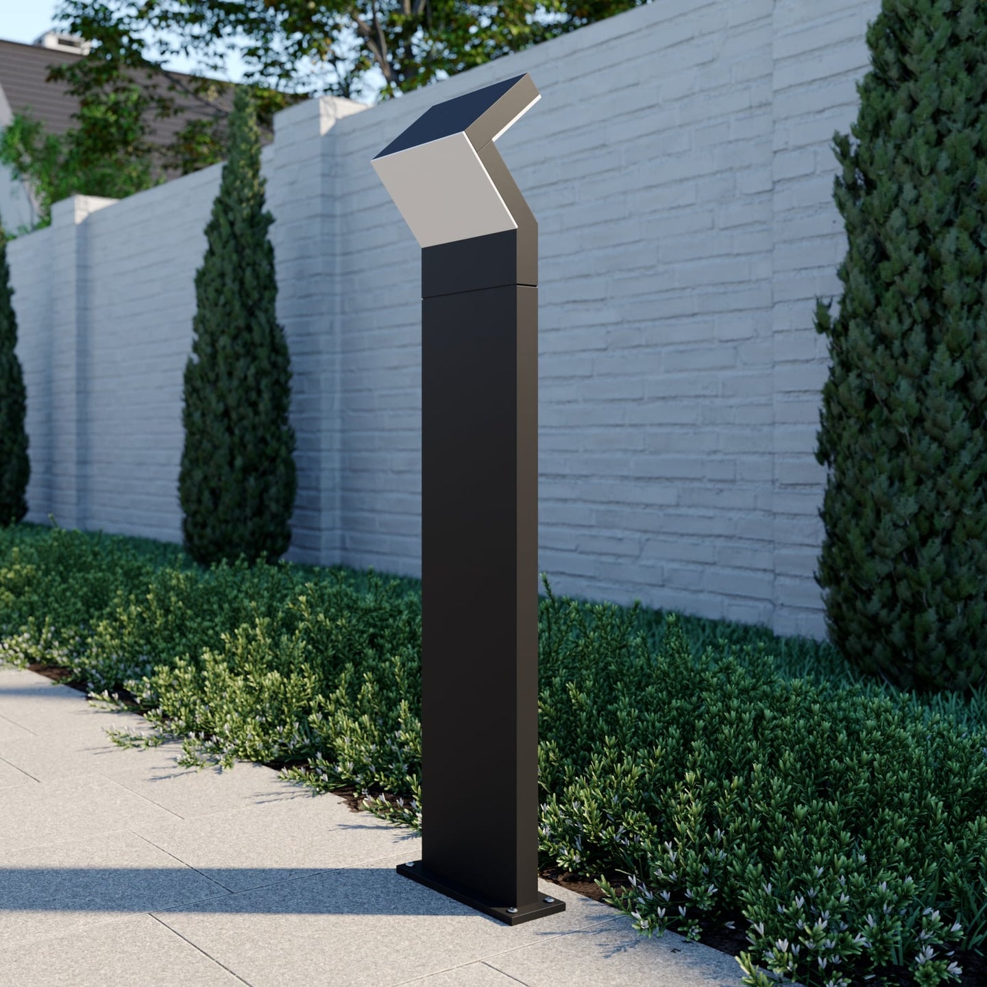 Havo Tall Path Light in daylight showing the full 100 cm anthracite post beside a hedge