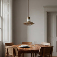 Lusa pendant light unlit in a panelled dining room by daylight