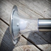 Detail of the Jolo solar spike light showing the integrated LED under the clear flared diffuser