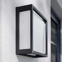 Angled view of the Auri square outdoor wall light showing the shallow 9.5 cm projection and the glazed side panel