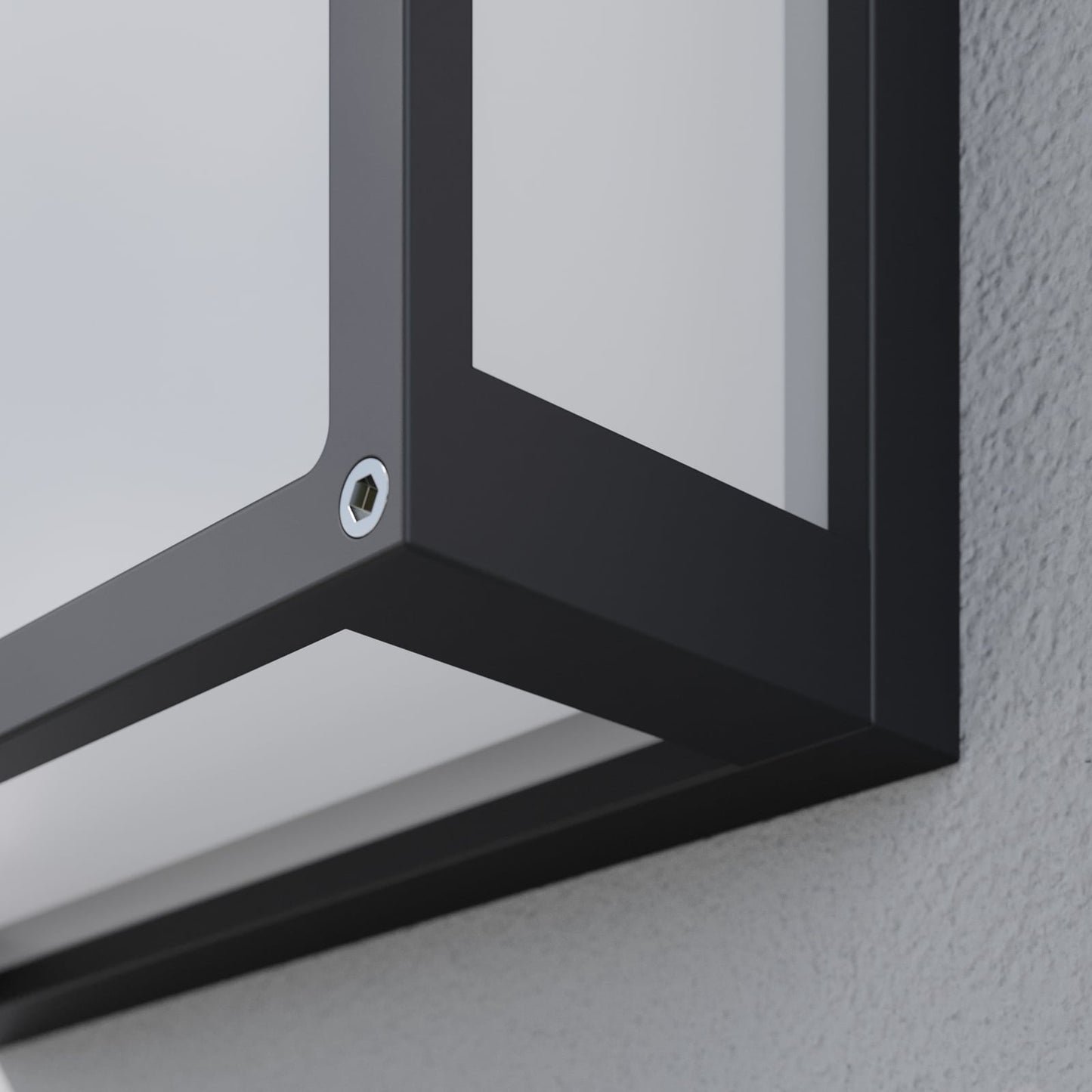 Close-up of a corner of the Auri square outdoor wall light showing the hex socket screw and the matte dark grey frame edge