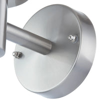 Detail of the round stainless steel wall plate and arm on the Davo outdoor light
