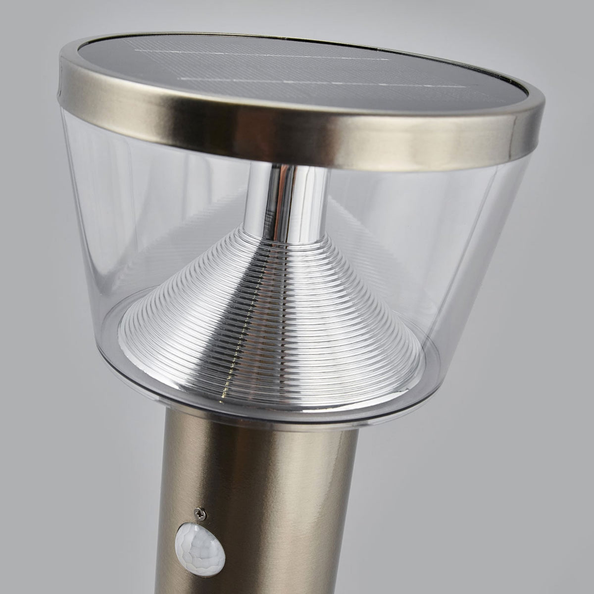 Close view of the Anjo Solar Pedestal Light head showing the solar panel and reflector