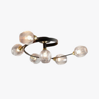 Orvello glass cluster ceiling light with six amber shades on a black spiral arm, plain white background