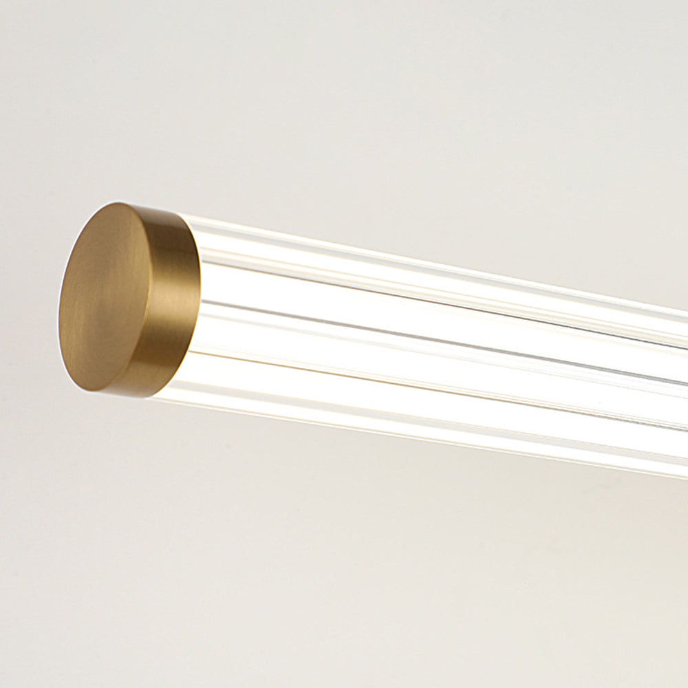 Close view of the brass end cap and ribbed acrylic tube on the Miralo wall light