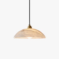 Delo alabaster dome pendant light with brass lampholder on a plain white background