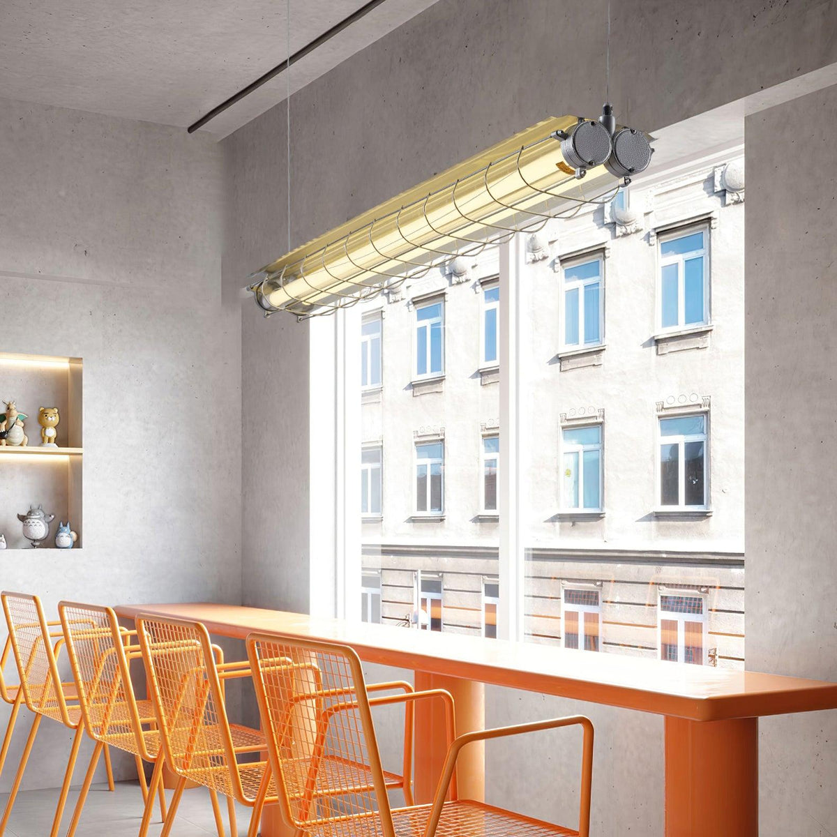 Arsen linear bar pendant light lit above a long counter in a concrete-walled room