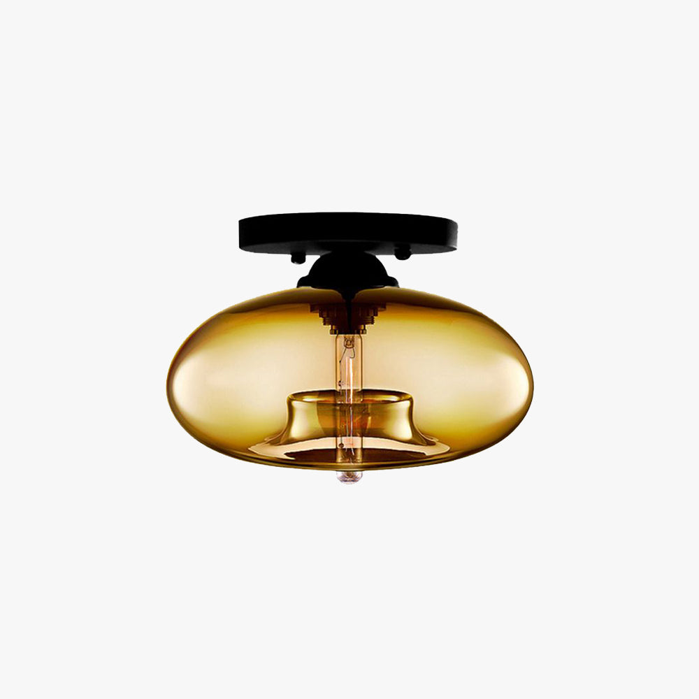 Valto Globe Ceiling Light with amber glass shade on a black flush mount