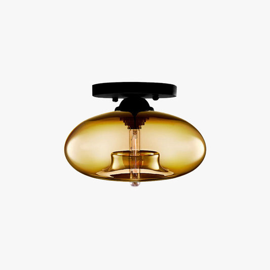 Valto Globe Ceiling Light with amber glass shade on a black flush mount