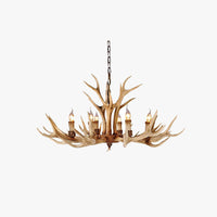 Stagra six-light antler resin candle chandelier in brown on a plain background