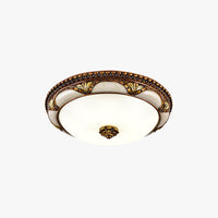 Epora Antique Brass Ceiling Light on a plain white background showing the ornate brass rim and frosted glass dome