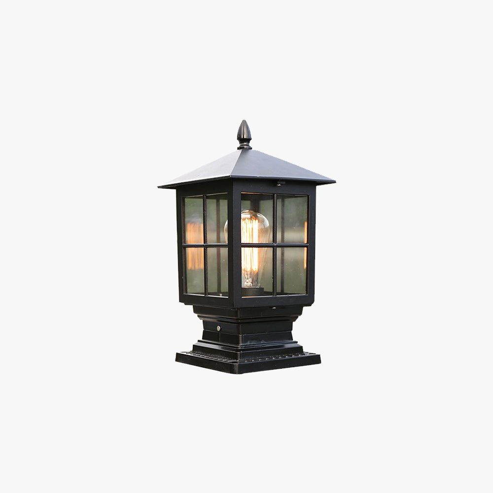 Lockhone Ashlow lantern outdoor post light in black metal and clear glass with pyramid roof and finial on a plain background