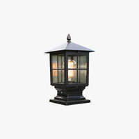 Lockhone Ashlow lantern outdoor post light in black metal and clear glass with pyramid roof and finial on a plain background