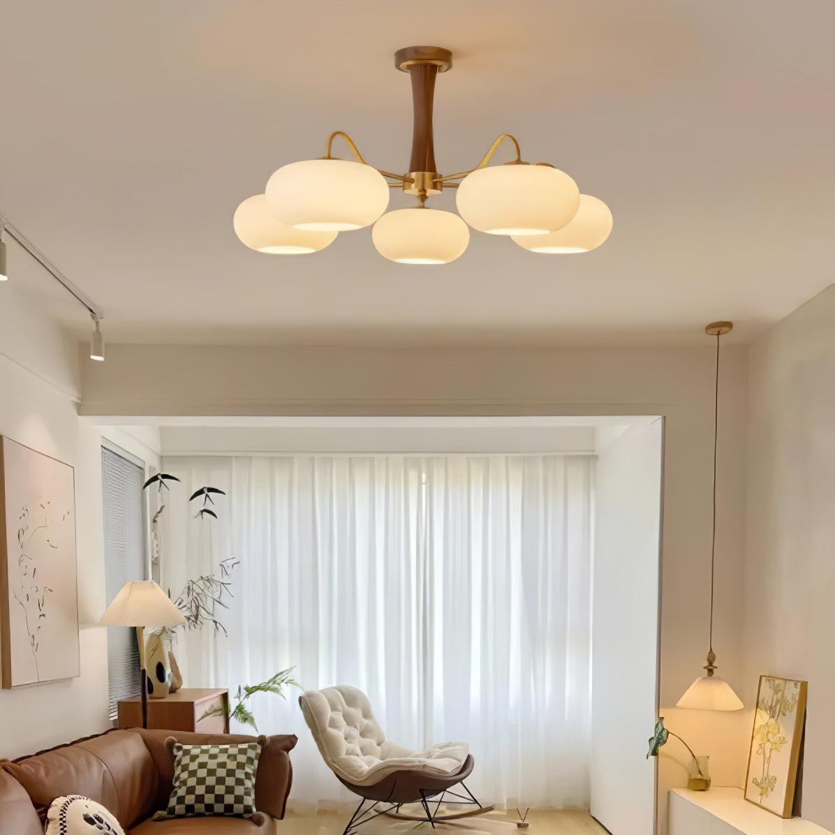 Sova chandelier in an elegant living room with leather sofa