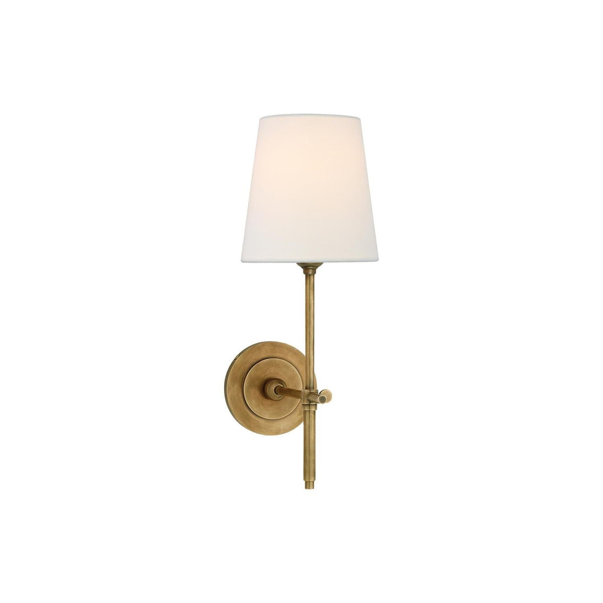 Thedo brass fabric wall light shown from the side with round brass backplate