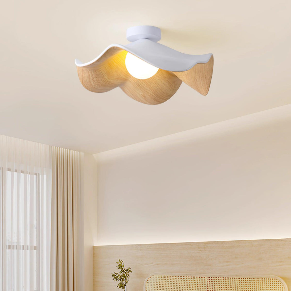 Tamsi flush mount ceiling light in a bright neutral living room with pale timber panelling