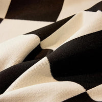 Chequerboard Tasselled Sofa Cover