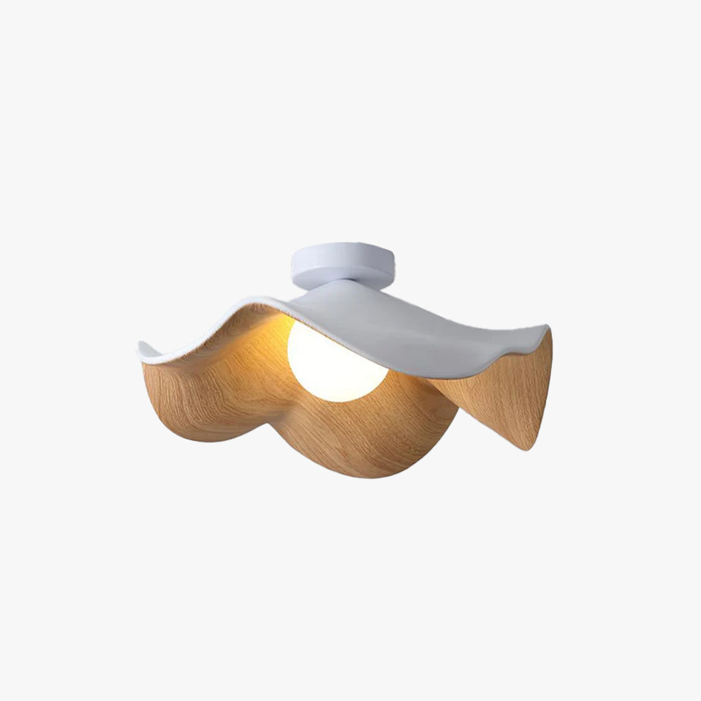 Tamsi wavy wood flush mount ceiling light with white canopy and wood-grain petal shade on a plain background