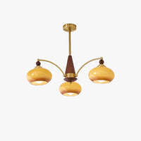 Remi retro 3-arm chandelier caramel amber glass plain background