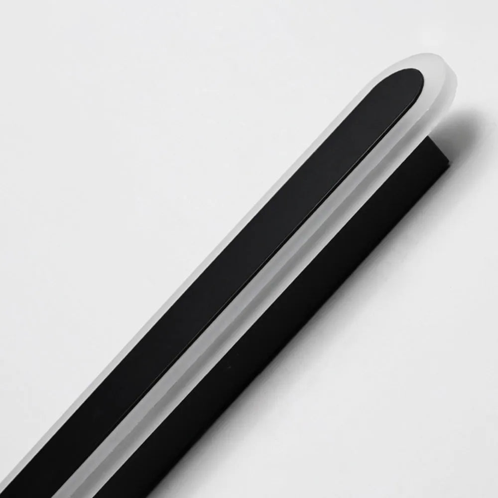 Close-up detail of the Orvo acrylic diffuser and black metal body