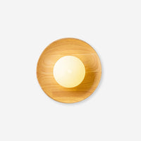 Tamso round wood wall light with opal glass globe on a plain white background