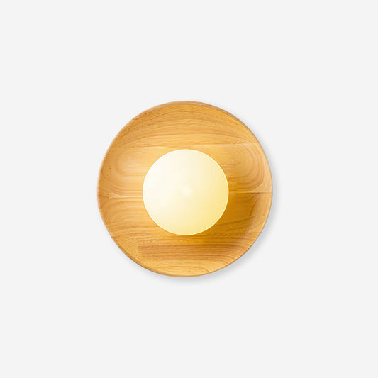 Tamso round wood wall light with opal glass globe on a plain white background
