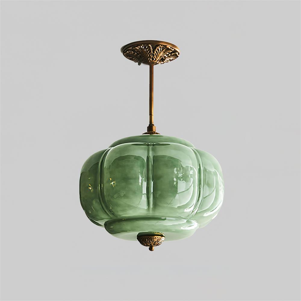 Eldo green glass semi flush mount light shown with a longer gold stem on a plain background