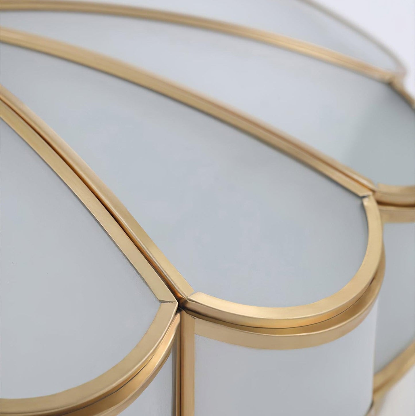 Close up of the Ulina brass finish frame and frosted glass panel seams