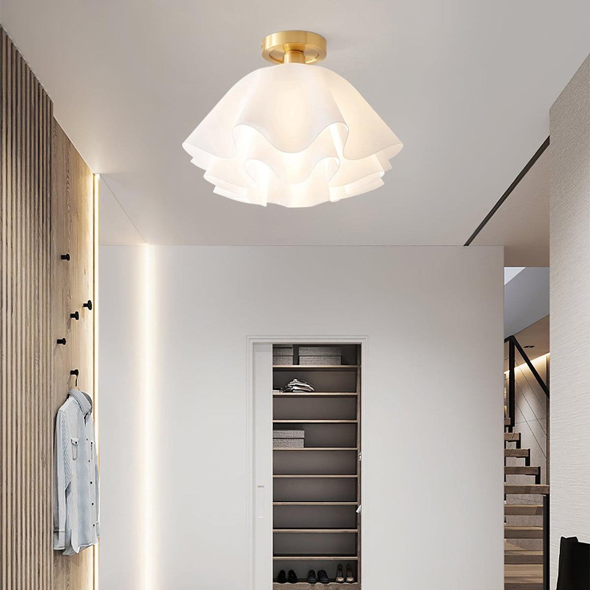 Ondra petal ceiling light fitted in a hallway with slatted timber panelling and a wardrobe
