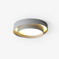 Belna ceiling light lit, showing the warm glow escaping from the step between the two drums