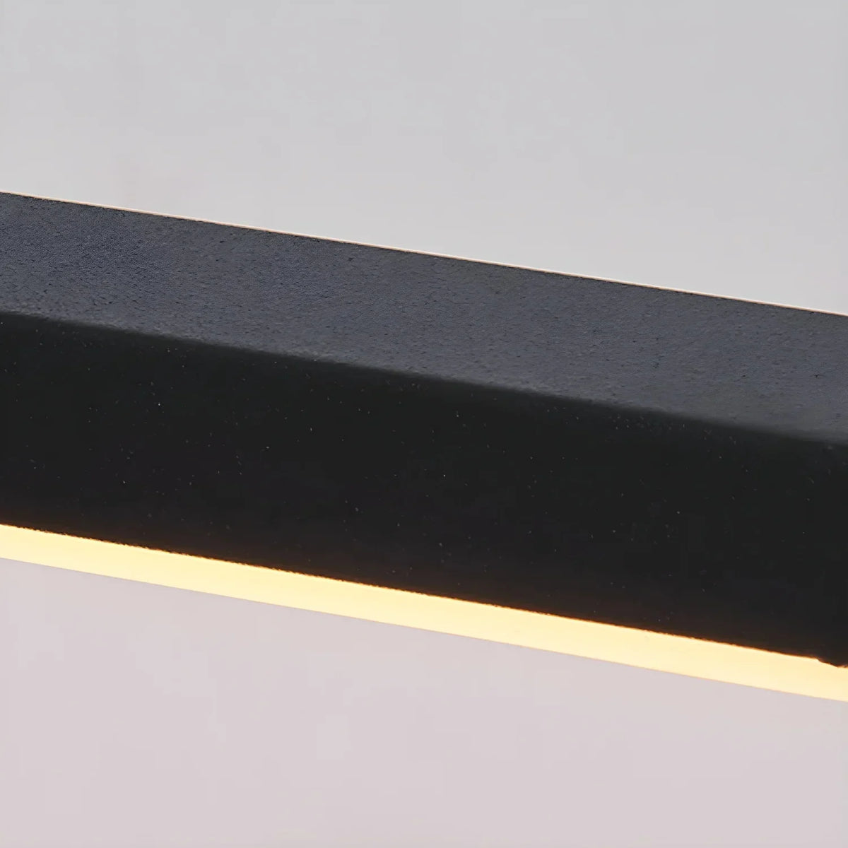 Nira LED mirror light acrylic diffuser strip close-up warm glow detail