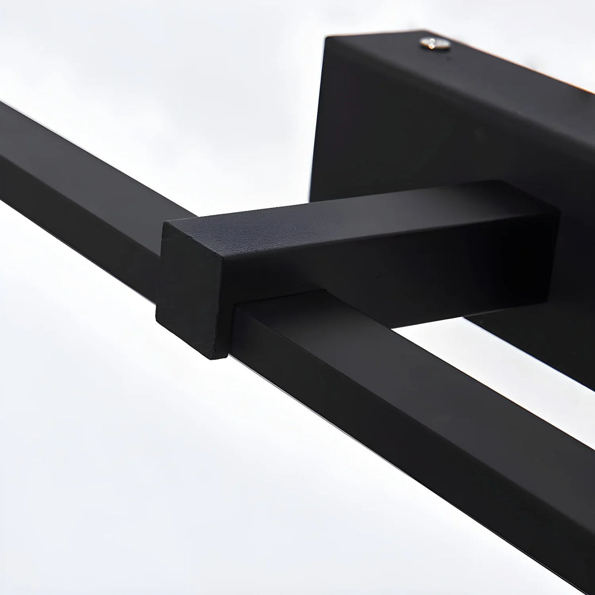Nira LED wall light close-up of mounting bracket construction