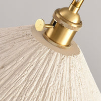 Close up of the knurled brass lamp holder and thumb screw on the Plavo pendant