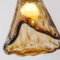 Orva Amber Glass Semi-Flush Light - extreme close-up of amber marbled glass lit from inside