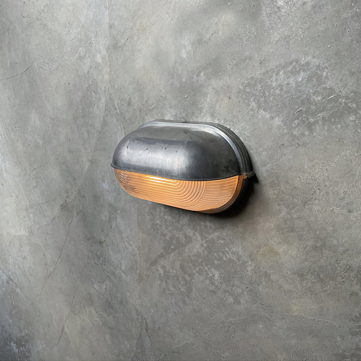 Angled view of the Estwin outdoor wall light showing how far the fitting stands off the wall