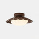 Wynto scalloped walnut ceiling light on a plain background showing the fluted wood-effect shade and opal glass diffuser