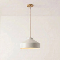 Hano ivory metal cone pendant light with antique brass rod on a plain background