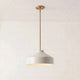 Hano ivory metal cone pendant light with antique brass rod on a plain background
