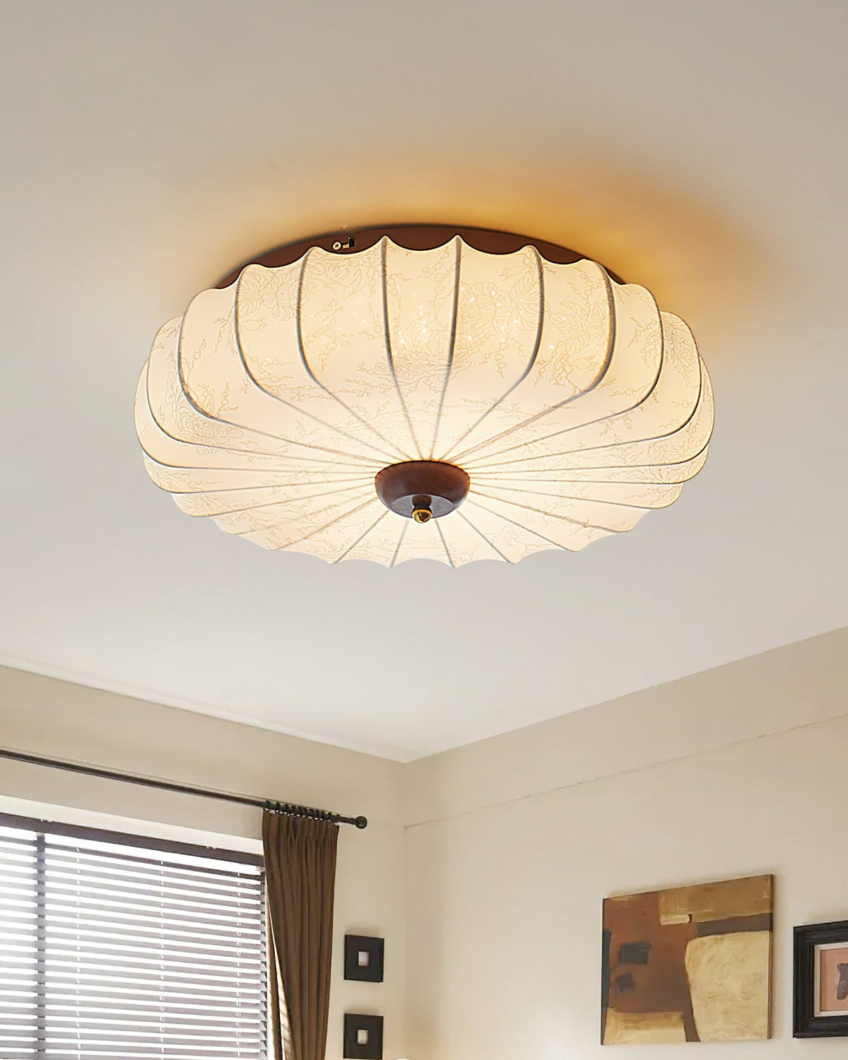 Larso pleated fabric ceiling light fitted to a white ceiling in a daylit room