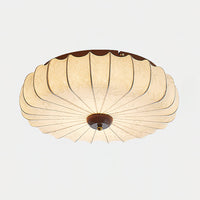 Side view of the Larso flush mount ceiling light showing the depth of the pleated fabric shade