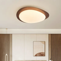Quisto Pebble Walnut Ceiling Light fitted in a living room with timber panelling